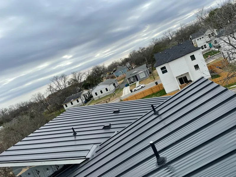Standing seam metal roof panels with vents for Skylight Repair in Aledo